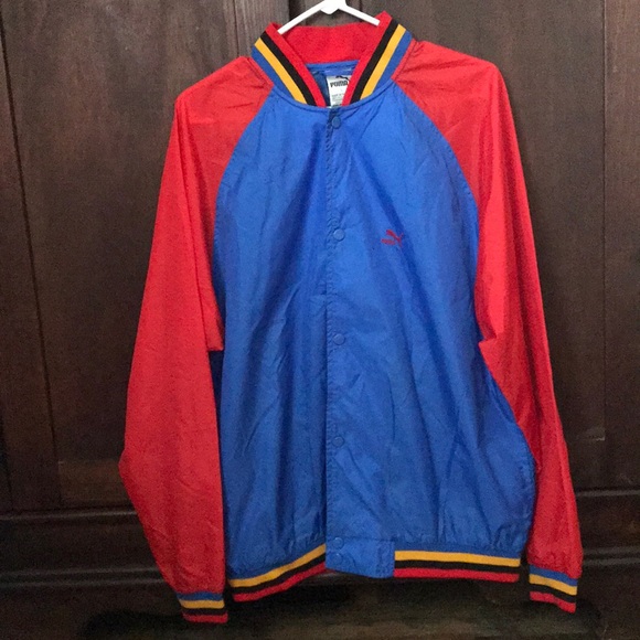 red blue yellow puma shirt